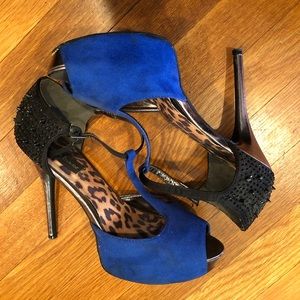 Blue and black spiked heels